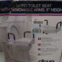 Drive Medical 2-in-1 Raised Toilet Seat with Removable Padded Arms - Elevated Bathroom Safety Support - Secure Locking Attachment - Easy Height Assistance - Durable Construction, Standard Toilets
