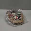 Let It Snow Hello Kitty and Friends Tealite Candle House, 7.5" L x 6" W x 7.65" H Created by Blue Sky Clayworks