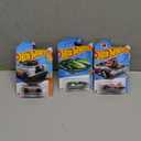 Hot Wheels - Land Rover Series II - HW Hot Truck 5/10 - HTC32 - Short Card - Track Stars - Good Year - Mattel 2024-1:64, Hot Wheels 2024 - Collector # 027/250 - HW Celebration Racers 01/10 - HW Braille Racer - Twin Mill - Satin Green - World Braille Day,  Matchbox Hot Wheels Rodger Dodger, HW Celebration Racers 5/10 [Silver] 77/250, Pack Of 3 Hot Wheels Cars