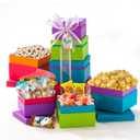 Broadway Basketeers Easter Basket Tower Premade Gift for adults, Kids, Boys, Girls - Includes Gourmet Chocolate, Candy, Easter Eggs a Great Easter Care Package for Family & Friends