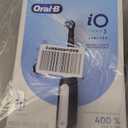 OralB iO Deep Clean Rechargeable Electric Powered Toothbrush, Black with iO Series 3 Limited, 2 Brush Heads and Travel Case  Pressure Sensor to Protect Gums  3 Cleaning Settings  2 Minute Timer