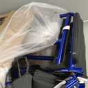 Medline Lightweight Foldable Transport Wheelchair with Handbrakes and 12-Inch Wheels, Blue Frame, Black Upholstery