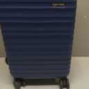 Amazon Basics 21" Hardside Carry-On Luggage, Hardshell Suitcase With Wheels, Expandable For Up to 25% More Space, With Scratch-Resistant Surface, Four Multi-directional Wheels, Navy Blue