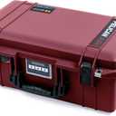 Oxblood Pelican 1535 Air case, with Black Handles & latches. Comes Empty & with Wheels.