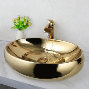 23 Inch Bathroom Vessel Sink with Waterfall Faucet and Pop-Up Drain Combo,Gold Ceramic Sink Bowl Modern Vessel Sink Above Counter Oval Bathroom Sink Basin