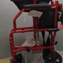 Medline Ultra Lightweight Transport Wheelchair for Adults, Foldable, 19-Inch Seat Width, Red Frame, Black Upholstery