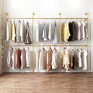 Amazon.com: Industrial Pipe Clothing Rack, Heavy Duty Metal Clothes Rack with Double Rods for Hanging Clothes, Wall Mount Space-Saving Garment Display Rack (Three, Gold) : Home & Kitchen
