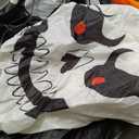 JOYIN 8.5ft Halloween Inflatable Skeleton, Blow Up Skeleton Holding Pumpkin for Rooftop Outdoor Decoration with LED Light, Blow Up Skeleton Sitting On The Roof for Halloween Rooftop Yard Party Decor