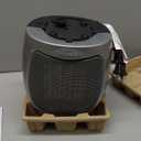 Amazon Basics Ceramic Space Heater, Portable Indoor Heating Solution, With Overheat and Tip-Over Protection, Thermostat, Non-Oscillating, 1500W, 7.52"D x 6.34"W x 9.45"H, Silver