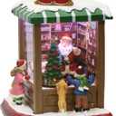 Lighted Santas Toy Shop Christmas Village by Moments in Time LED Lights, Music & Animation Battery Operated 8.8 Holiday Building Gift Ready Christmas Decoration (Red)
