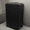 Amazon Basics 30" Hardside Large Checked Luggage, Hardshell Suitcase With Four Multi-directional Wheels, Expandable For Up to 15% More Space, Scratch-Resistant Shell, Black