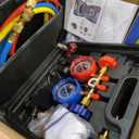 Orion Motor Tech AC Vacuum Pump and Gauge Set, 1/3 hp 4 cfm Vacuum Pump Manifold Gauge Kit with Leak Detector 3 Hoses & Accessories for R134a R12 R22 R502, A/C Vacuum Pump Kit for Auto HVAC Systems. Oil has leaked and the item is stained.