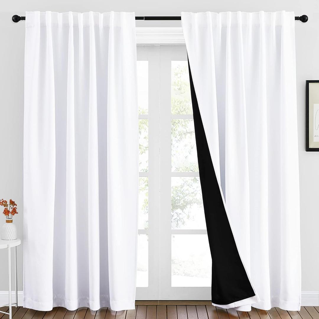 NICETOWN 100% Blackout Window Curtains, Cold and Full Light Blocking Drapes with Black Liner for Nursery, 84 Inches Thermal Insulated Draperies for Living Room (Pure White, 2 Pieces, 70 inches Wide)