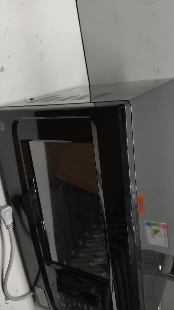 GE GCST14S1WBB 1.4 Cu. Ft. Black Countertop Microwave (Door stock can't open)