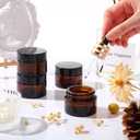 Domensi 60 Pcs 1oz Glass Jars with Lids Bulk Salve Tins Winter Cream Container Small Glass Cosmetic Jars for Travel Lip Balm with Inner Liners for Lotion Sample Cream(Amber, Black Lid)