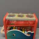 B. toys- Xylo-Pound Whale- Musical Instrument  Wooden Hammer & Balls  Developmental Toy for Toddlers  1 Year +
