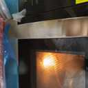 Farberware 1.7 Cu. Ft. Over-the-Range Microwave Oven  1000 Watts Power, Auto Cook Settings, Defrost, Easy Clean and Child Safety Lock - Stainless