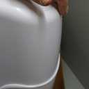 Diaper Genie Platinum PailHands-free odour-locking diaper pail (white) includes Easy Roll tear-off bags holding up to 846 newborn diapers.