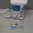 TUREWELL Water Flossing Oral Irrigator, 600ML Dental Cleaner 10 Adjustable Pressure, Electric Oral Flosser for Teeth/Braces, 8 Replacement Jet Tips for Family (White)