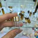 16pcs Tiny Glass Jars With Lids,Mini Glass Bottles,Essential for Travel and the Kitchen Leak-Proof Small Flask for Liquids,16x27mm Small glass Vials(Golden)