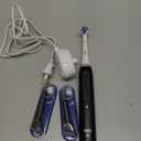 Oral-B iO Deep Clean + Whiten Rechargeable Electric Toothbrush with Visible Pressure Sensor, 2 Minute Timer, 5 Cleaning Settings, 1 iO5 Limited, 3 Toothbrush Heads, Travel Case & Refill Holder, Black