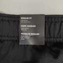 adidas Men's Essentials Warm-up Open Hem 3-stripes Tracksuit Bottoms,Straight Leg, Medium Size,Black on Black
