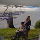 Medline Ultra Lightweight Transport Wheelchair for Adults, Foldable, 19-Inch Seat Width, Red Frame, Black Upholstery