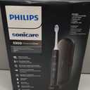 Philips Sonicare ProtectiveClean 5300 Rechargeable Electric Toothbrush, with Pressure Sensor, 3 Cleaning Modes, SmarTimer and QuadPacer, with 2 Bonus Brush Heads, Travel Case, Black, Model HX6423/34