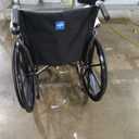 Medline Comfortable Folding Wheelchair with Swing-Back, Desk-Length Arms and Elevating Footrests, 18W x 16D Seat,