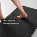 RESARE Waffle Bath Mat for Bathroom, Super Absorbent Bathroom Rugs Non Slip Machine Washable, Ultra Soft Quick Dry Boho Bath Rugs with Tassels for Floor, Upgraded Bordered Design, 24"x36" Black