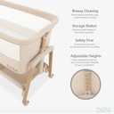 Evolur Lullaby Portable Bassinet with Wheels, Adjustable Bedside Sleeper, Breathable Mesh Sides, Large Storage Basket, Easy Fold, and Travel Bag Included, Perfect for Newborns & Infants - Biege