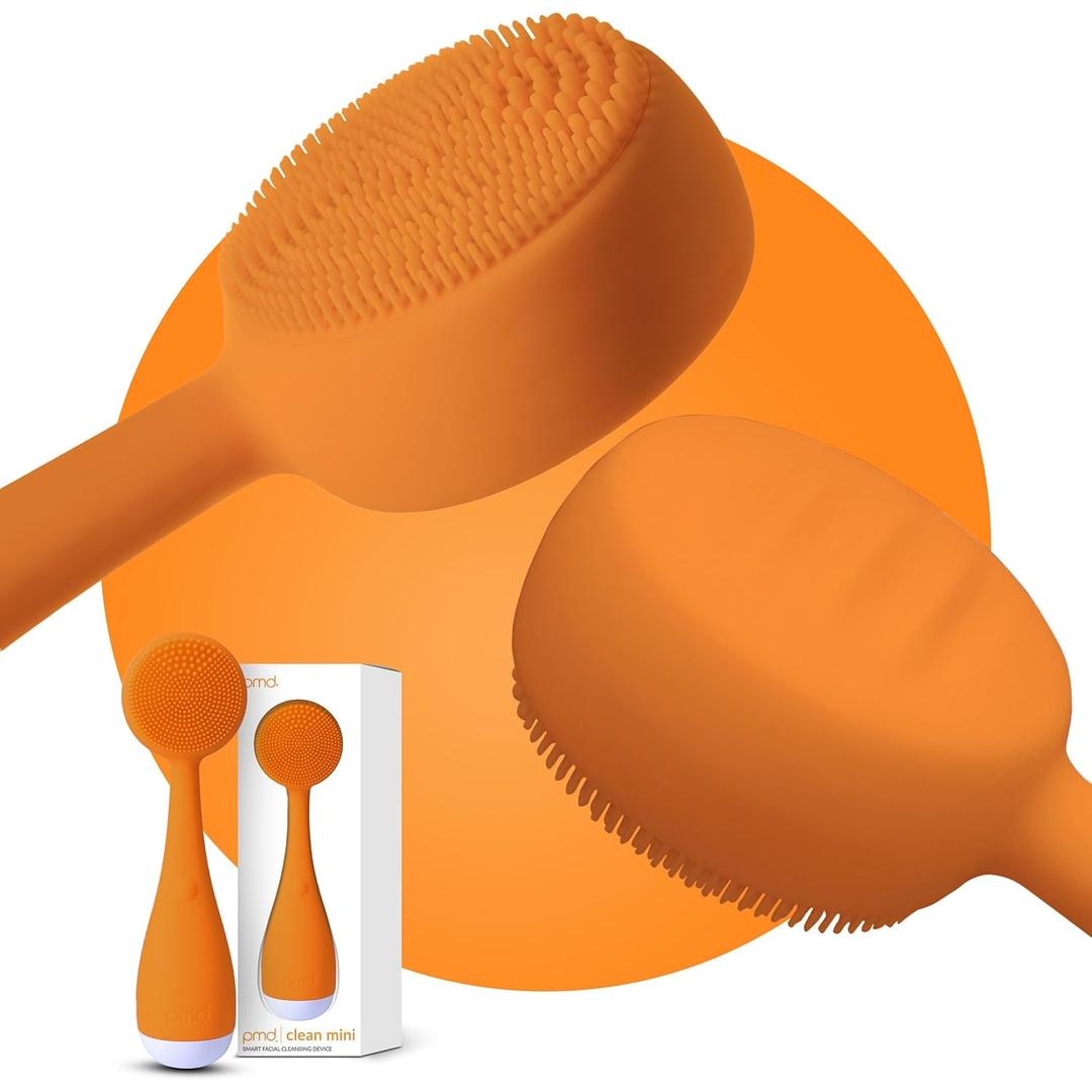 PMD Clean Mini - Smart Facial Cleansing Device with Silicone Brush & Anti-Aging Massager - Waterproof - SonicGlow Vibration Technology - Clear Pores and Blackheads - Lift, Firm, and Tone Skin (Orange)