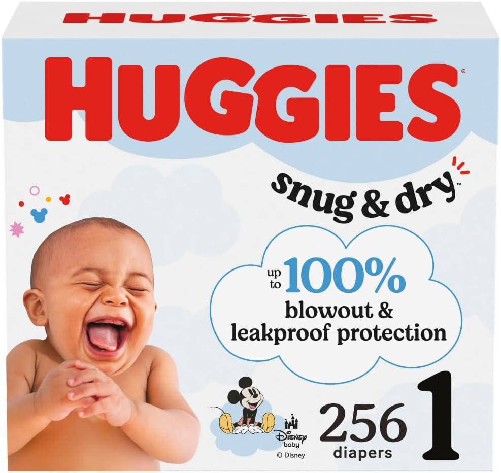 Huggies Size 1 Diapers, Snug & Dry Newborn Diapers, Size 1 (8-14 lbs), 256 Count (4 Packs of 64), Packaging May Vary