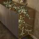 Hairui Lighted Artificial Olive Garland 6FT 96 LED Fairy Lights Battery Operated, Faux Vine Lights with Timer for Spring Christmas Holiday Fireplace Decoration