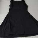 QINSEN Womens Open Back Tennis Dress Sleeveless Built in Shorts Golf Athletic Dress with Pockets (Large, Black)