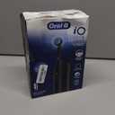 Oral-B Rechargeable Electric Toothbrush, iO Limited Simple Clean, 3 Cleaning Modes, Automatic Pressure Sensor to Protect Gums, Travel Case, Night Black