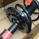 Monroe Quick-Strut 172936 Suspension Strut and Coil Spring Assembly for Nissan Pathfinder