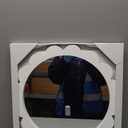 White sun-shaped mirror