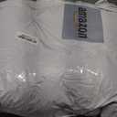 JOLLYVOGUE Calming Dog Bed Medium Size Dog, Anti-Anxiety Donut Medium Pet Bed, 27 inches Fluffy Faux Fur Round Cat Bed (Smoke Black) (27.0"L x 27.0"W x 8.0"Th, Dark Grey)