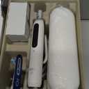 Oral-B iO Series 5 Rechargeable Electric Toothbrush with Visible Pressure Sensor to Protect Gums, 2 Minute Timer, 5 Cleaning Settings, 1 Replacement Toothbrush Heads, and Travel Case, White