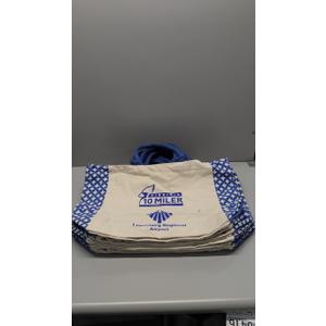 7 large tote bags, beige, blue straps, blue logo, pattern