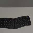 Ergonomic Foldable Keyboard, Portable Folding Travel Bluetooth Keyboard for Business and Travel, 3 Devices Dual-Mode(2.4G+BTx2) Ultra Slim Wireless Keyboards for Windows, iOS, Android, Use on the Leg