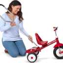 Radio Flyer Deluxe Steer & Stroll Trike, Red, for Kids 2-5, 2-in-1 Parent Steer Tricycle, Removable Push Handle, Adjustable Seat, Steel Frame, Covered Storage Bin, Tricycle for Toddlers and Kids