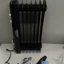 Dumos Oil Filled Radiator Heater with Adjustable Thermostat, 1500W Oil Space Heater for Indoor Use, Portable, 22inch Bright Black