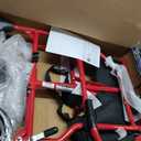 Medline Lightweight Foldable Transport Wheelchair with Handbrakes and 12-Inch Wheels, Red Frame, Black Upholstery