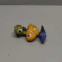 The First Years Disney Finding Nemo Bath Toys - Dory, Nemo, and Squirt  Squirting Kids Bath Toys for Sensory Play - 3 Count