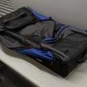 Amazon Basics 35-Inch Large Rolling Duffel Bag for Travel with Wheels and Handle, Durable Ripstop Polyester, 2 Layers of Space, Multiple Interior and Exterior Pockets, Blue