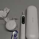 Oral-B iO Deep Clean + Protect Rechargeable Electric Toothbrush, White with a iO Series 7 Toothbrush, 2 Replacement Brush Heads, and a Charging Travel Case
