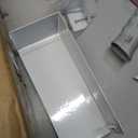 Steel grille for a bath hood
