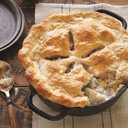 Lodge Cast Iron Dutch Oven 2 Quart - Loop Handle Cooking Vessel - Even Heat Retention - Oven-Safe, Versatile Pot